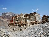 Mustang 01 03-2 Tangbe Entrance Chortens Just before entering Tangbe (3060m), the first village in Upper Mustang, I saw the first of many black, white and red Upper Mustang chortens.